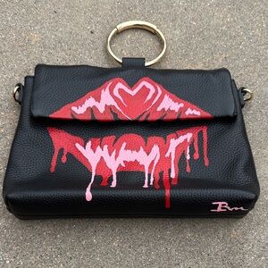 Vince Camuto Black Clutch with Red Lip Design